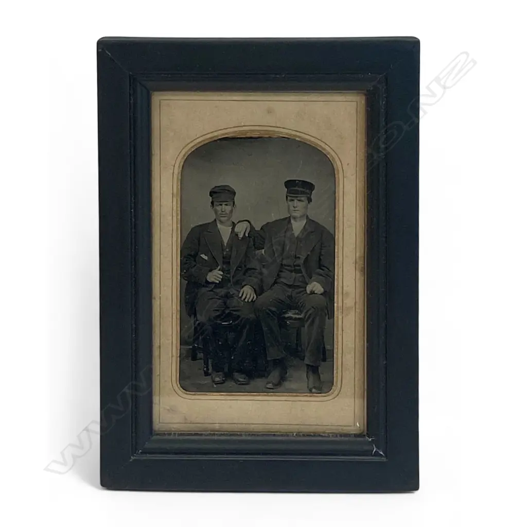 Card-mounted tintype - two seated men in caps, Image 1++